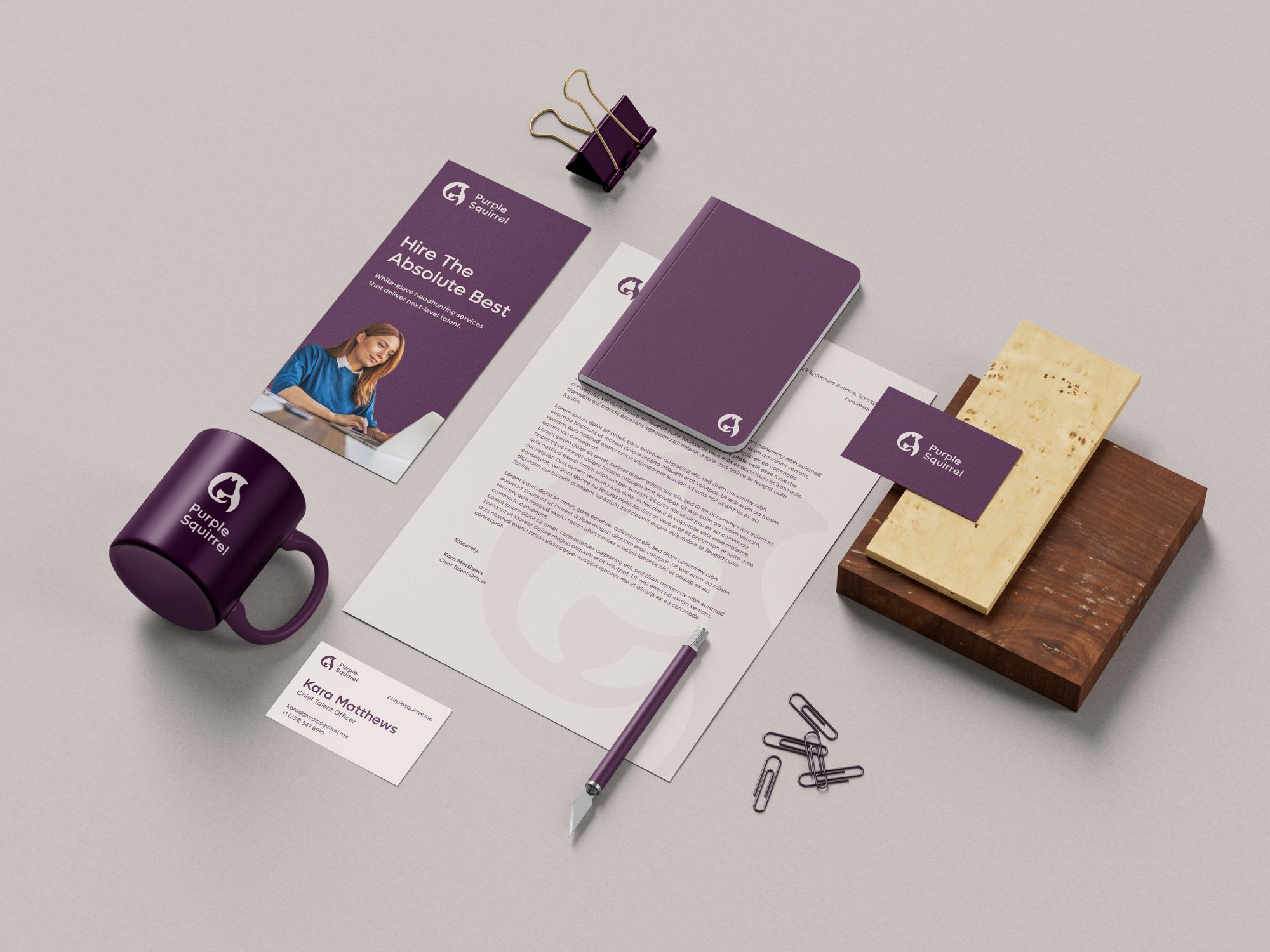 Purple Squirrel stationery, brochure, mug and notebook